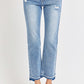 Risen Uneven Hem Jeans